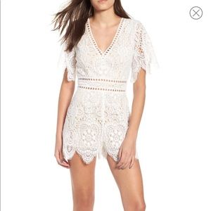 Socialite Lace Romper. Never worn. Size Large.